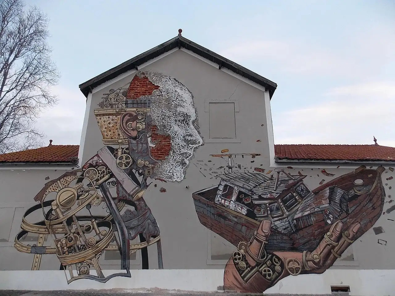 Large mural painted on the end wall of a building in Lisbon