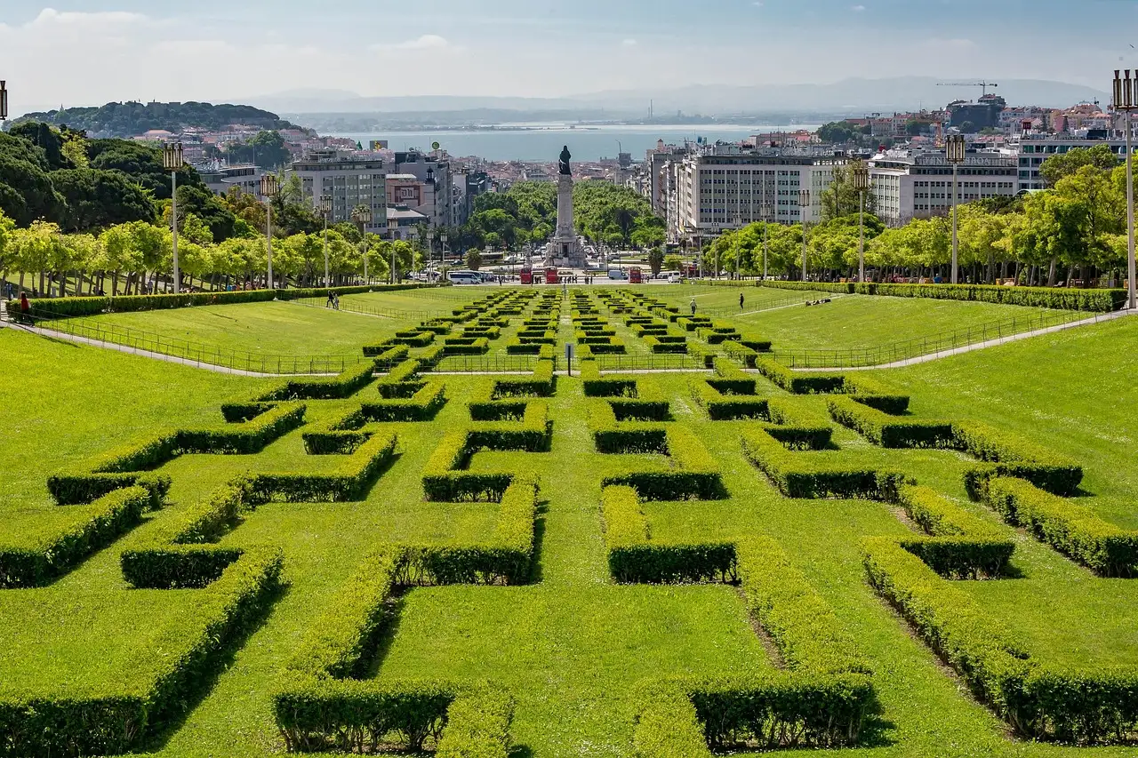 Hedge parterre of Parque Eduardo VII in Lisbon, sloping down toward the city and the river