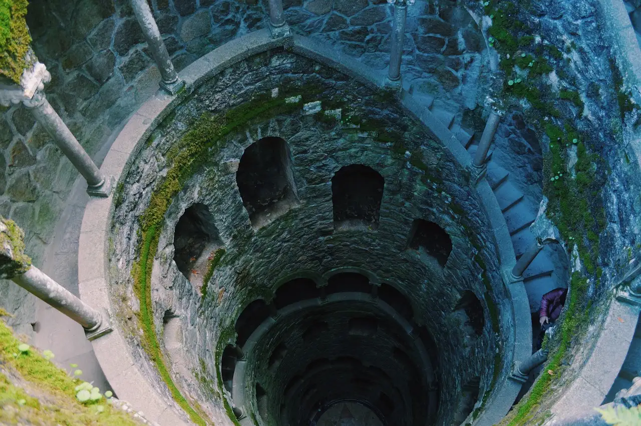 Spiral staircase of the Initiation Well at Quinta da Regaleira in Sintra, seen from above